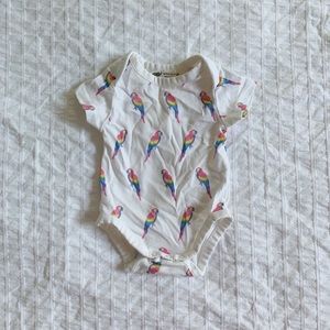 Monica + Andy “Polly Wants a Cracker” Onesie